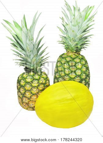 honeymelon and two pineapples tropical fruit isolated