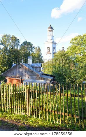 Rural landscape with the Orthodox Church of St. Alexander Nevsky in Ust-Izhora town St.Petersburg suburb Russia.