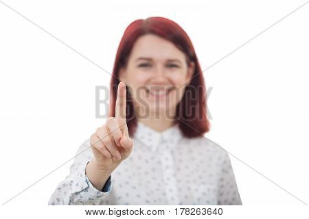 Young Smiling Businesswoman Student on blurred background touching digital interface with her finger.
