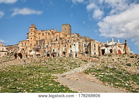 Craco, Matera, Basilicata, Italy: view of the ghost town that was abandoned  due to natural disasters and now is a tourist attraction and a filming location