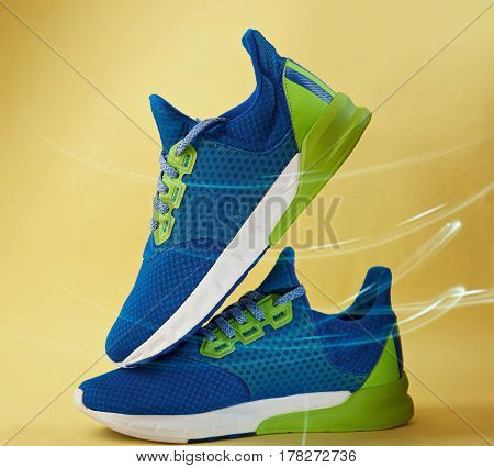Pair Of Blue Colorful Running Shoes