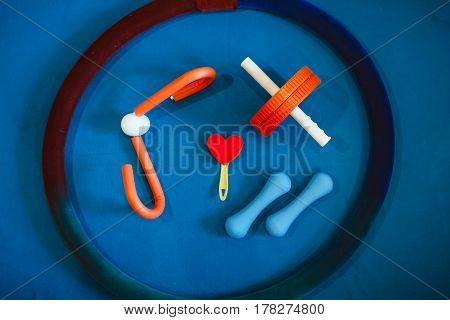 Weight scale healthy snack measuring tape and dumbbells on a table weight loss and sports concept flat lay