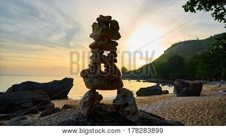 A figure from stones at sunset in Phuket