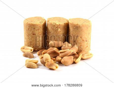 Pacoca Brazilian peanut candy eaten during Festa Junina "June Festival" with roasted peanuts - isolated