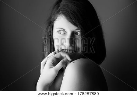 black and white portrait of a young attarctive brunette woman