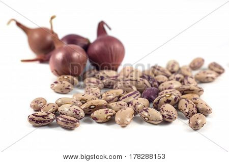 Colorful Beans And Onion Isolated On White Background