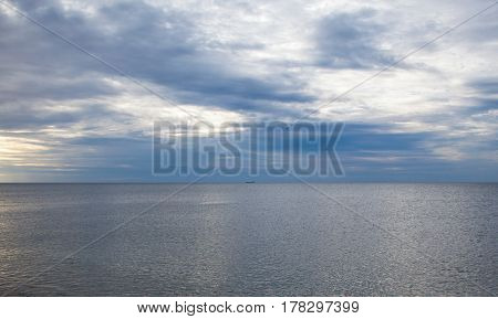 Ship lying at anchor in the roads in the Black Sea. Distant view.