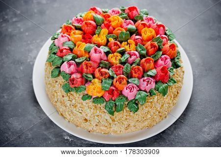Buttercream flower tulip cake beautiful festive cake decorated with colorful cream flowers for spring holidays