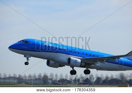 Amsterdam the Netherlands - March 25th 2017: PH-EXK KLM Cityhopper Embraer ERJ-175 takeoff from Polderbaan runway.