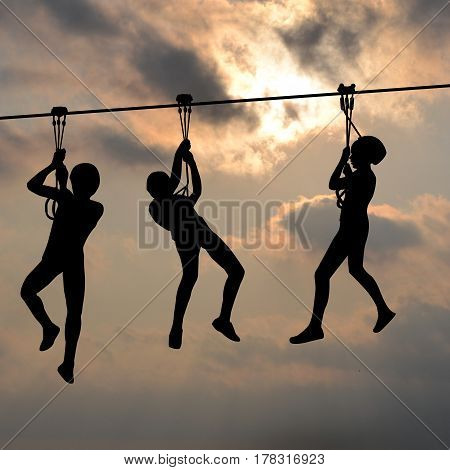 Children silhouettes gliding on the flying fox contraption against a blue cloudy sky