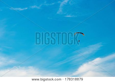 Man Ride Paramotor Flying In The Sky