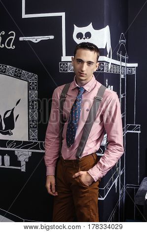 Guy in retro style in brown pants