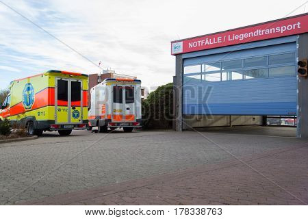 PEINE / GERMANY - MARCH 20 2017: two german ambulance vehicles stands on hospital at peine / germany