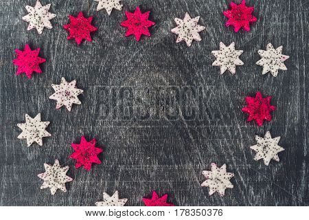 Pieces Of Sliced Dragon Fruit In The Form Of A Star On An Old Withered Background