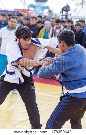 Shymkent, KAZAKHSTAN - 22 March 2017: Celebration of the Kazakh holiday NARIYZ. Competition wrestlers .