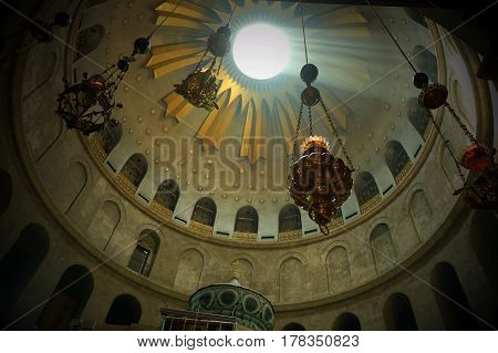 Lampades hang under the main dome of the Church of the Holy Sepulcher