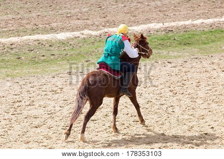 Shymkent, KAZAKHSTAN - 22 March 2017: Celebration of the Kazakh holiday NARIYZ. Competitions on horses .