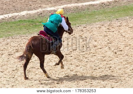 Shymkent, KAZAKHSTAN - 22 March 2017: Celebration of the Kazakh holiday NARIYZ. Competitions on horses .