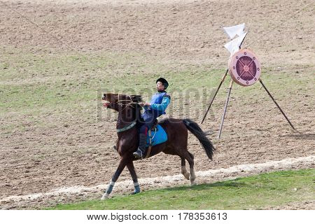 Shymkent, KAZAKHSTAN - 22 March 2017: Celebration of the Kazakh holiday NARIYZ. Competitions on horses .
