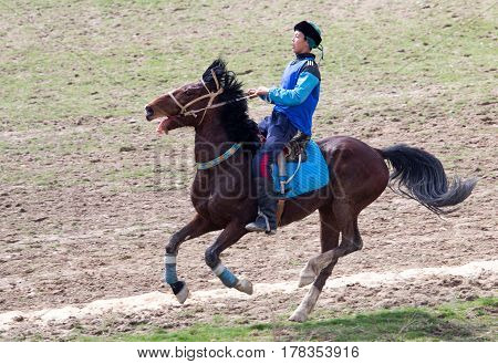 Shymkent, KAZAKHSTAN - 22 March 2017: Celebration of the Kazakh holiday NARIYZ. Competitions on horses .