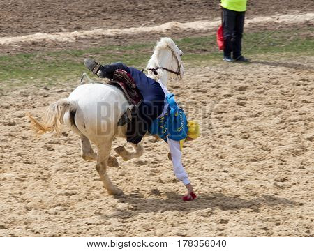 Shymkent, KAZAKHSTAN - 22 March 2017: Celebration of the Kazakh holiday NARIYZ. Competitions on horses .