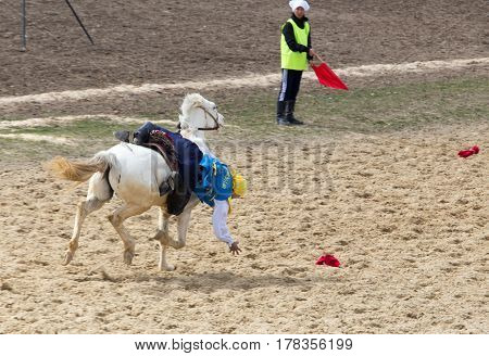 Shymkent, KAZAKHSTAN - 22 March 2017: Celebration of the Kazakh holiday NARIYZ. Competitions on horses .