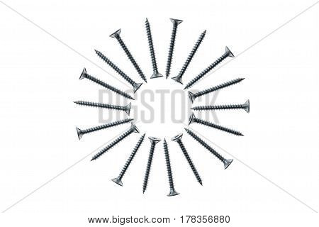 isolated metal screws arranged in circle on white background