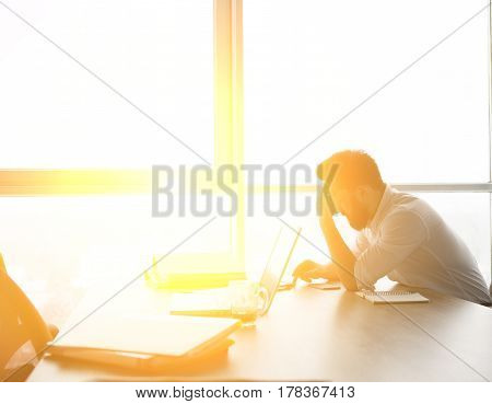 Toned of handsome worker waiting for interview with boss. Man having stress before being interviewed. Business concept. Freelance concept.