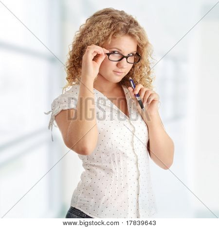 Beautiful corpulent caucasian student girl isolated on white background