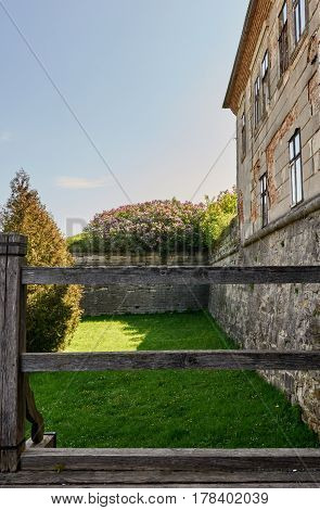 Facade of old medieval fortress in Dubno, Ukraine in summer