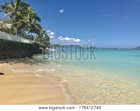 The beautiful clear waters of Lanikai Beach on the windward side of Honolulu, Hawaii. Photo taken March, 2017.