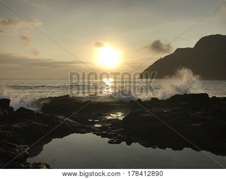 A gorgeous sunrise from the tide pools of Makapu'u Beach in Oahu, Hawaii.