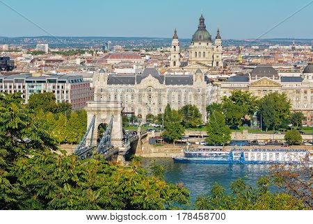 View of Chain Bridge, Gresham Palace, St Stephen Basilica and the Danube River from the Castle Hill of Budapest