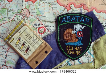 Chevron of Ukraine army.Back-Map of Ukraine  with location of Balakleya .Place of arsenal explosion at 23 march. 138 kT. of TNT power.March 23 ,2017 in Kiev, Ukraine