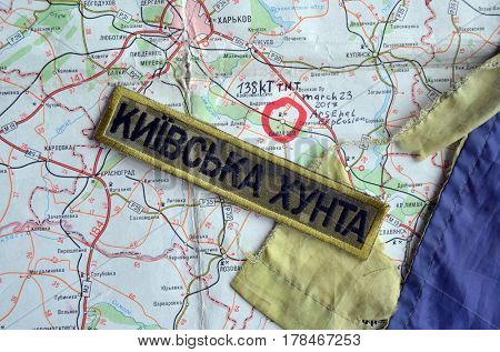 Chevron of Ukraine army.Back-Map of Ukraine  with location of Balakleya .Place of arsenal explosion at 23 march. 138 kT. of TNT power.March 23 ,2017 in Kiev, Ukraine