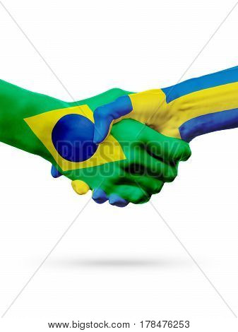 Flags Brazil Sweden countries handshake cooperation partnership friendship or sports team competition concept isolated on white