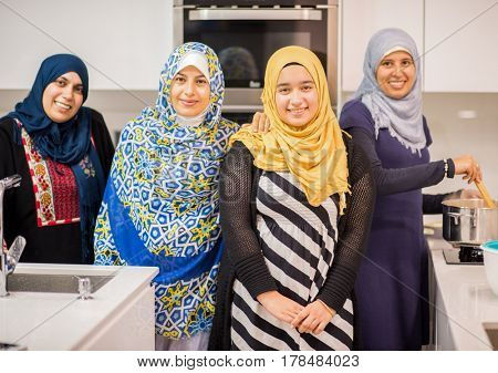 Arabian girls and women in kitchen