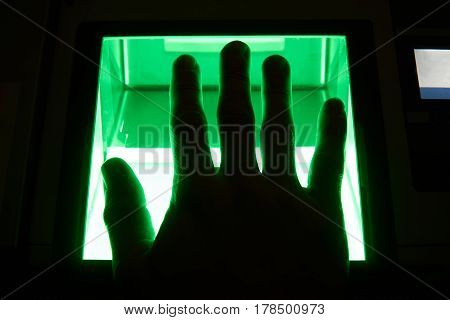 green cybersecurity digital fingerprint scanning on a green screen