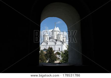 View of the white temple from window
Spaso-Prilutsky Christianity monastery Vologda Russia