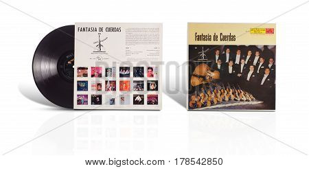 Rishon LeZion Israel-August 12 2016: Old vinyl mono album Fantasia de Cuerdas en Villa Fontana. This LP was manufactured in Mexico by RCA Victor Mexicana. Covers and vinyl disc are shooted on white background