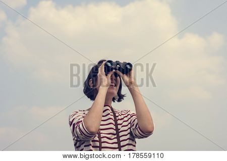 Woman using binocular explore searching