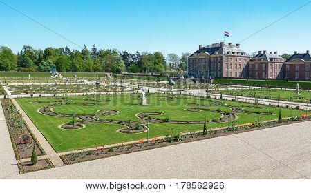 Apeldoorn The Netherlands May 8 2016: Dutch baroque garden of The Loo Palace a former royal palace and now a national museum located in the outskirts of Apeldoorn in the Netherlands