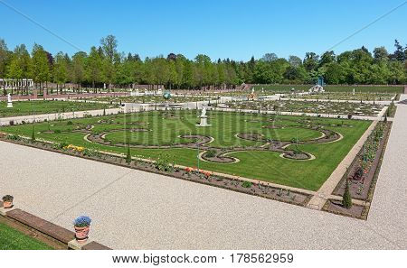 Apeldoorn The Netherlands May 8 2016: Dutch baroque garden of The Loo Palace a former royal palace and now a national museum located in the outskirts of Apeldoorn in the Netherlands