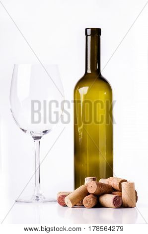 Wine bottle and wine glass on white background