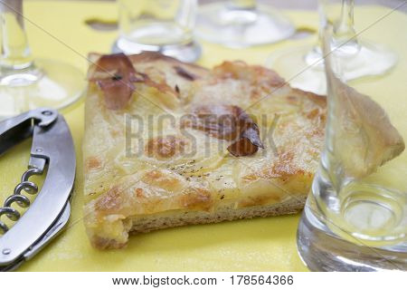 homemade crostino pizza with mozzarella and cured ham