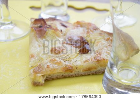 homemade crostino pizza with mozzarella and cured ham