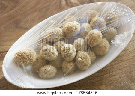 preparing stuffed fried olives called Ascolana olives