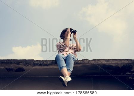 Woman using binocular explore searching
