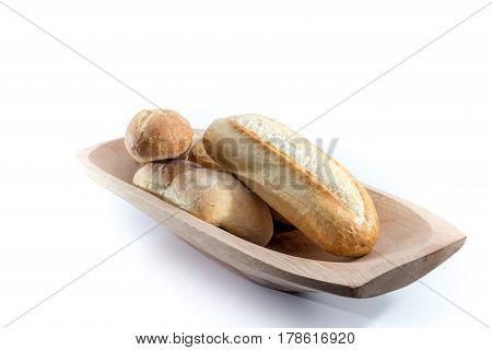 Mini French Baguettes On A Rectangular Wood Bowl With White Background