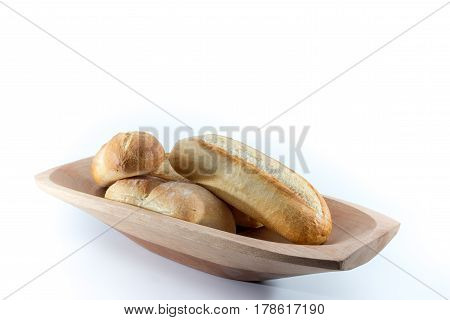 Mini French Baguettes On A Rectangular Wood Bowl With White Background -  Angle 2